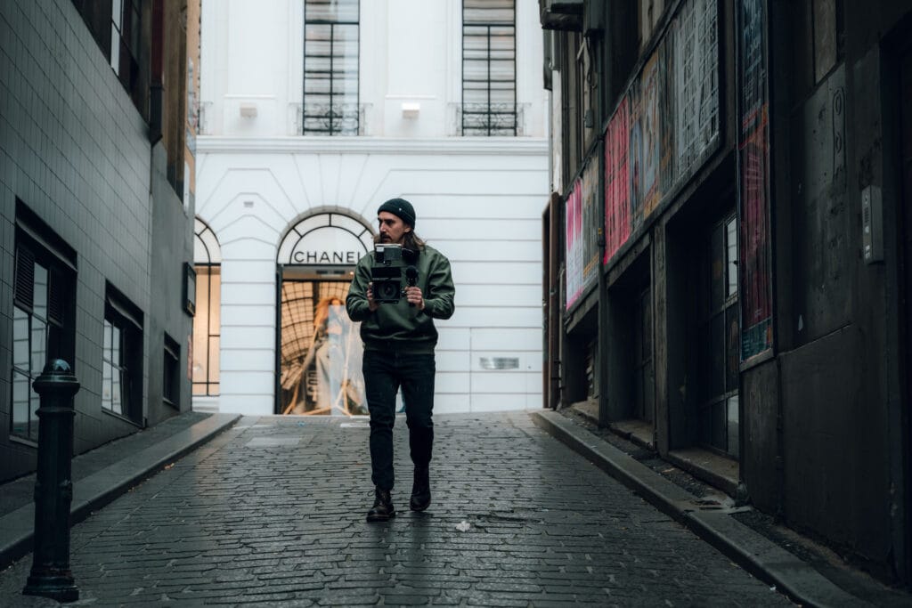 dymon creative services – filmmaker recording on an empty Melbourne street